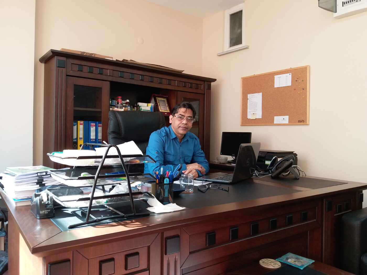 Dr. Dulal — At his clinic